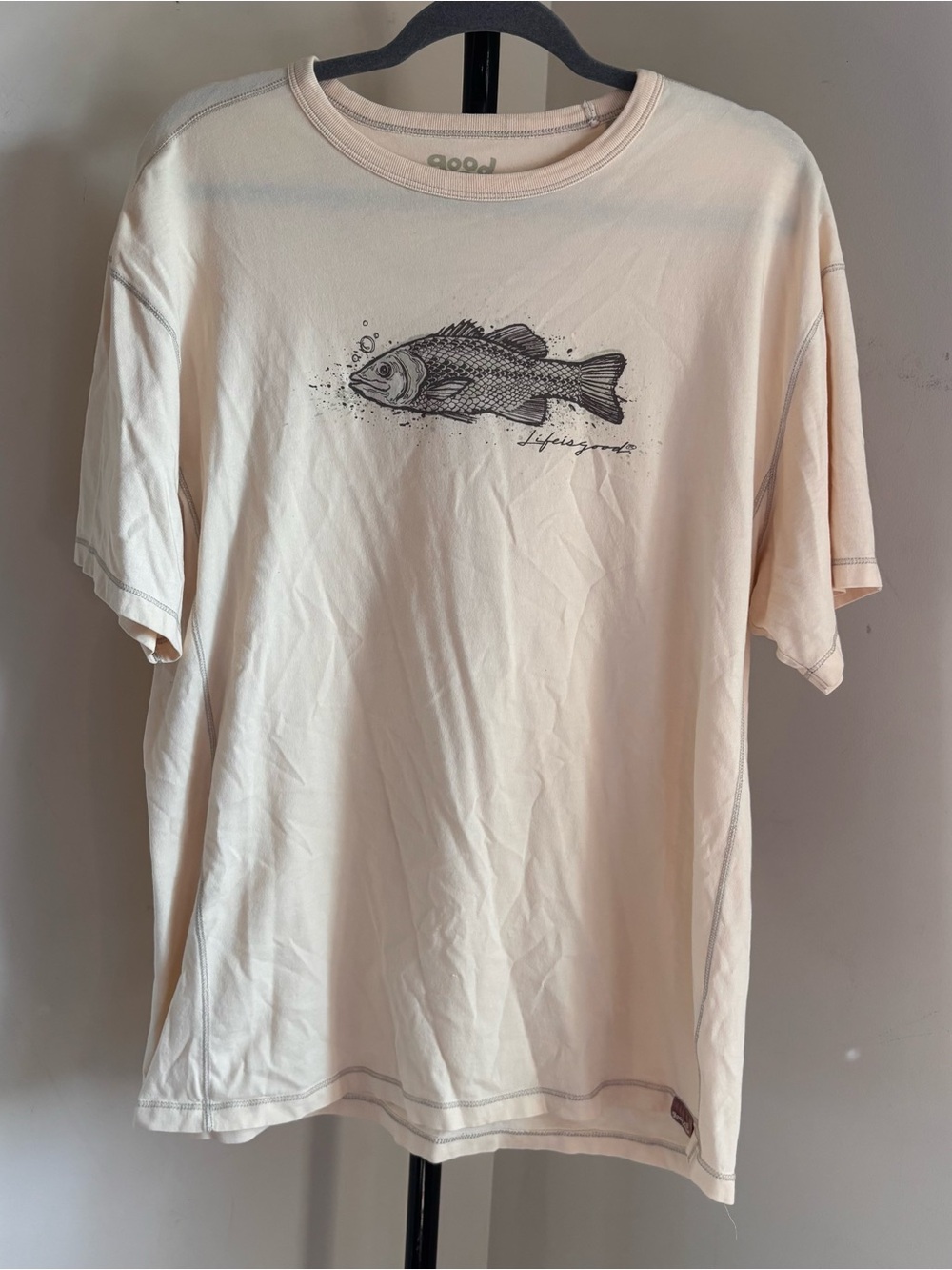Life is Good cream t-shirt with black fish graphic